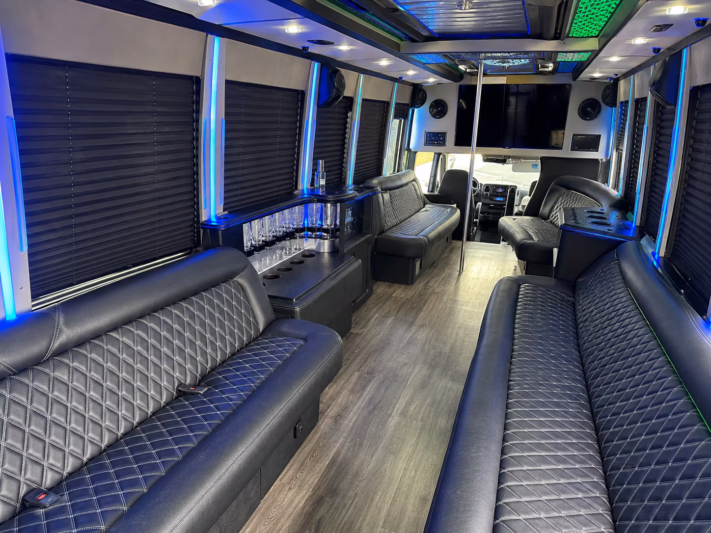 Group beside a Mercedes Sprinter limo in Sugar Land
