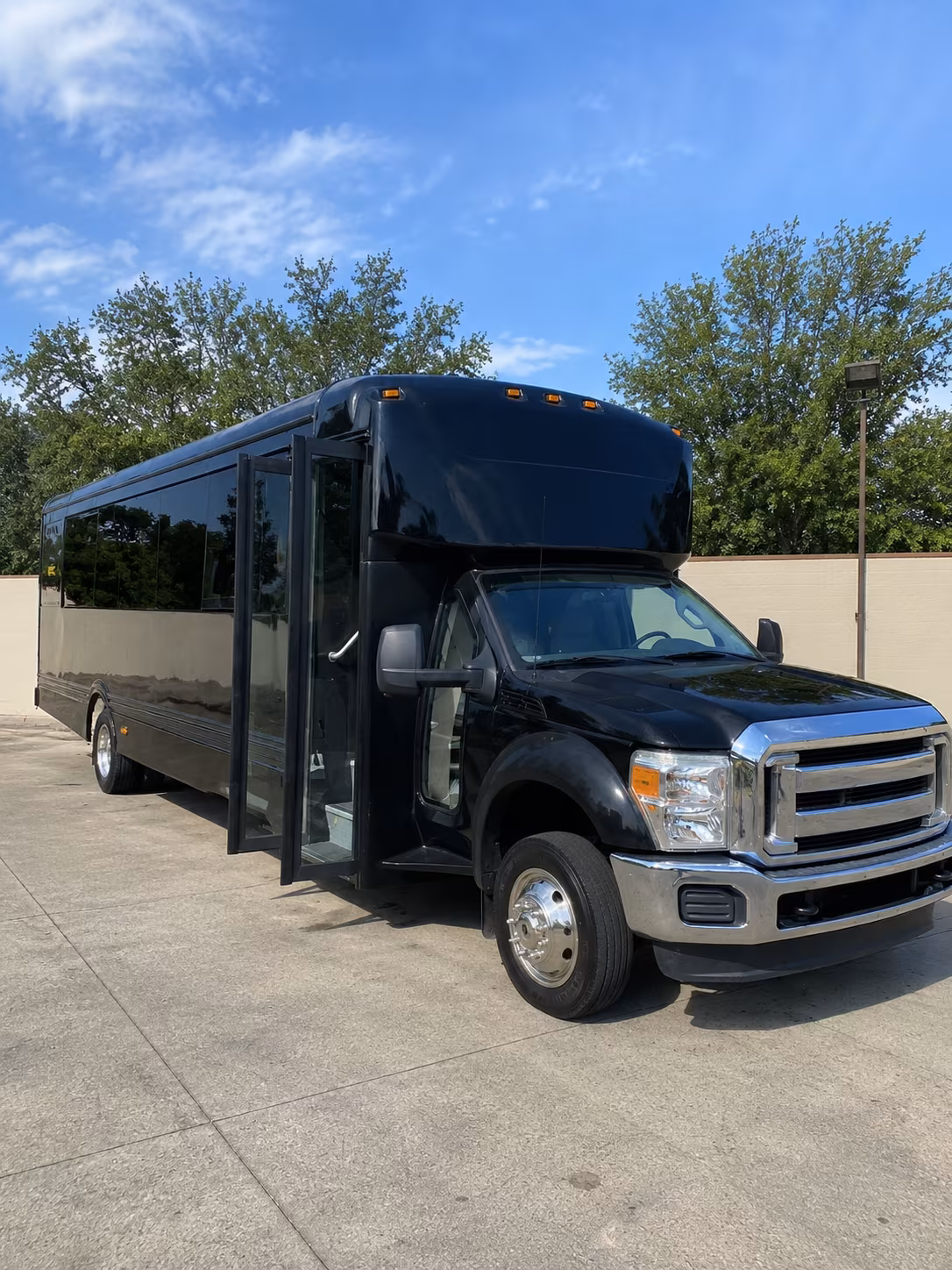 Wedding guests seated inside a party bus serving Sugar Land